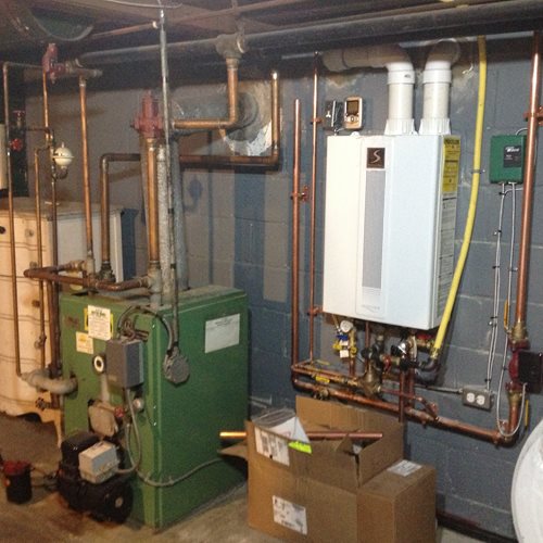 Oil boiler to high efficiency gas boiler conversion
